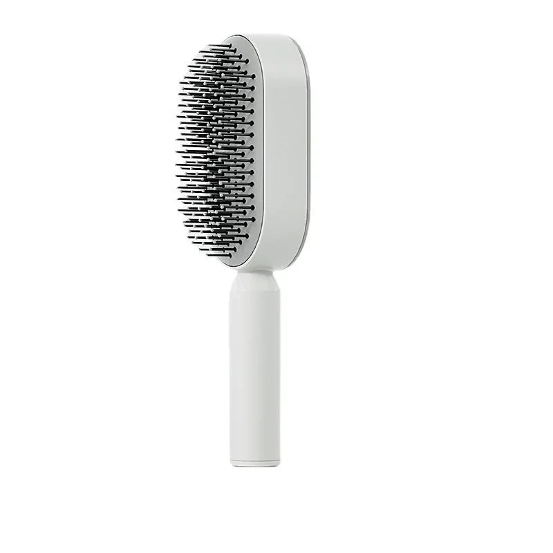 Brosse à cheveux autonettoyante